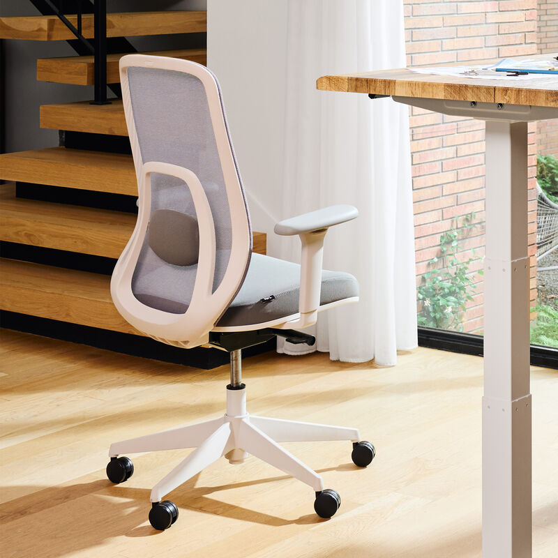 vari ascent chair in fog grey in home office setting with professional sitting image number null